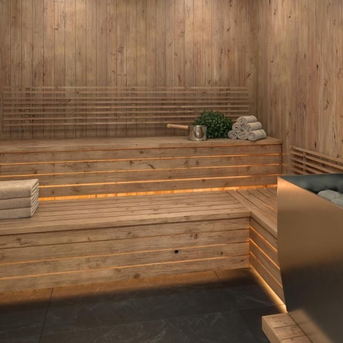 a sauna with towels on a bench