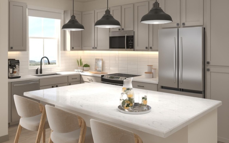 a kitchen with a table and chairs